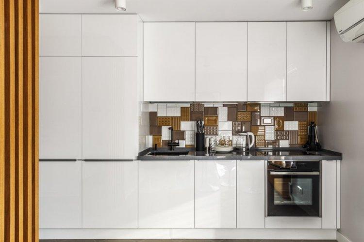 Lit gigogne dans le podium - Studio design d'appartement