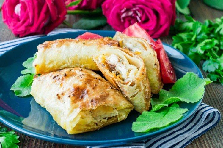 Poisson aux aubergines dans du pain pita