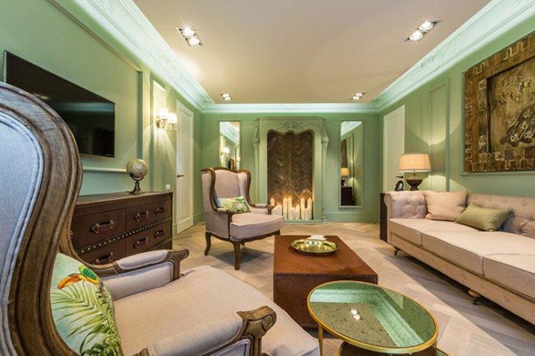 Couleur verte à l'intérieur du salon - conception de photo