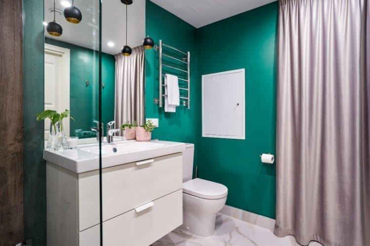 Couleur verte à l'intérieur de la salle de bain - conception de photo