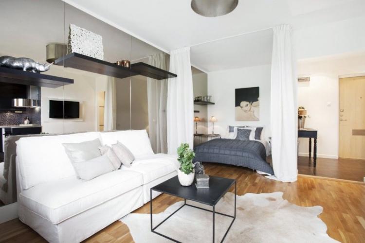 Zonage d'une pièce en une chambre et un salon - conception de photos